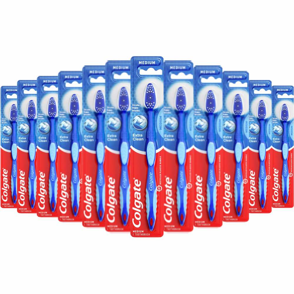 Multiple packs of Colgate toothbrushes with packaging on a white background - wholesale -